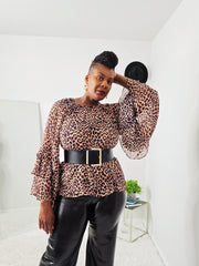 Vintage ruffle sleeve boho blouse in leopard brown print with feminine ruffle sleeves, breathable 100% cotton outer layer, and soft polyester lining – trendy women’s bohemian top.