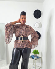 Vintage ruffle sleeve boho blouse in leopard brown print with feminine ruffle sleeves, breathable 100% cotton outer layer, and soft polyester lining – trendy women’s bohemian top.