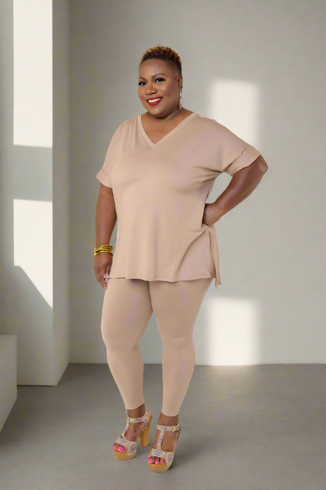 Experience the ultimate comfort and style with our Brushed DTY Microfiber V-Neck Top and Legging Set. This ensemble is designed to deliver unparalleled softness, courtesy of our buttery soft, 90% polyester and 10% spandex blend. The short sleeve top features a flattering V-neck, perfectly paired with matching leggings that offer the perfect stretch and recovery, ensuring you look and feel great with every move.  Product Description:  Material: