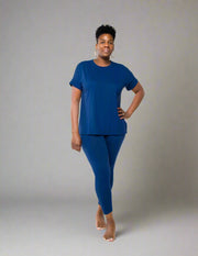 Experience the ultimate comfort and style with our Brushed DTY Microfiber V-Neck Top and Legging Set. This ensemble is designed to deliver unparalleled softness, courtesy of our buttery soft, 90% polyester and 10% spandex blend. The short sleeve top features a flattering V-neck, perfectly paired with matching leggings that offer the perfect stretch and recovery, ensuring you look and feel great with every move.