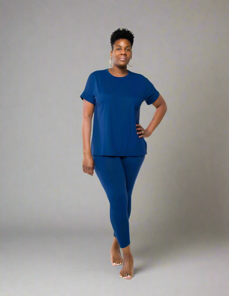 Experience the ultimate comfort and style with our Brushed DTY Microfiber V-Neck Top and Legging Set. This ensemble is designed to deliver unparalleled softness, courtesy of our buttery soft, 90% polyester and 10% spandex blend. The short sleeve top features a flattering V-neck, perfectly paired with matching leggings that offer the perfect stretch and recovery, ensuring you look and feel great with every move.