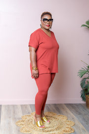 Experience the ultimate comfort and style with our Brushed DTY Microfiber V-Neck Top and Legging Set. This ensemble is designed to deliver unparalleled softness, courtesy of our buttery soft, 90% polyester and 10% spandex blend. The short sleeve top features a flattering V-neck, perfectly paired with matching leggings that offer the perfect stretch and recovery, ensuring you look and feel great with every move.  Product Description:
