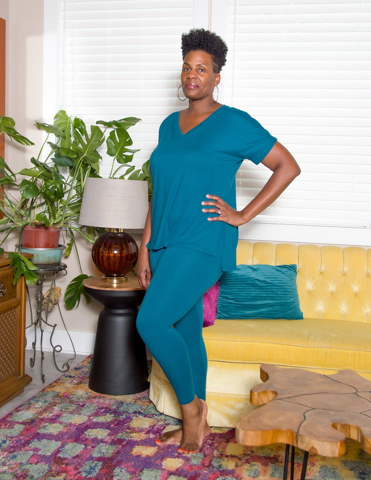 Experience the ultimate comfort and style with our Brushed DTY Microfiber V-Neck Top and Legging Set. This ensemble is designed to deliver unparalleled softness, courtesy of our buttery soft, 90% polyester and 10% spandex blend. The short sleeve top features a flattering V-neck, perfectly paired with matching leggings that offer the perfect stretch and recovery, ensuring you look and feel great with every move.  Product Description:  Material: Premium brushed DTY microfiber (90% Polyester, 10% Spandex)