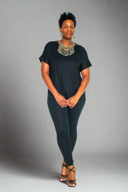 Experience the ultimate comfort and style with our Brushed DTY Microfiber V-Neck Top and Legging Set. This ensemble is designed to deliver unparalleled softness, courtesy of our buttery soft, 90% polyester and 10% spandex blend. The short sleeve top features a flattering V-neck, perfectly paired with matching leggings that offer the perfect stretch and recovery, ensuring you look and feel great with every move.  Product Description:
