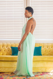 Black Multi Halter Style Jumpsuit  Elevate your wardrobe with our Black Multi Halter Style Jumpsuit, a chic and versatile piece perfect for various occasions. This jumpsuit features a halter neckline and a daring backless design that exudes confidence. The deep V-neckline enhances the elegant silhouette, while wide legs provide comfort and movement.