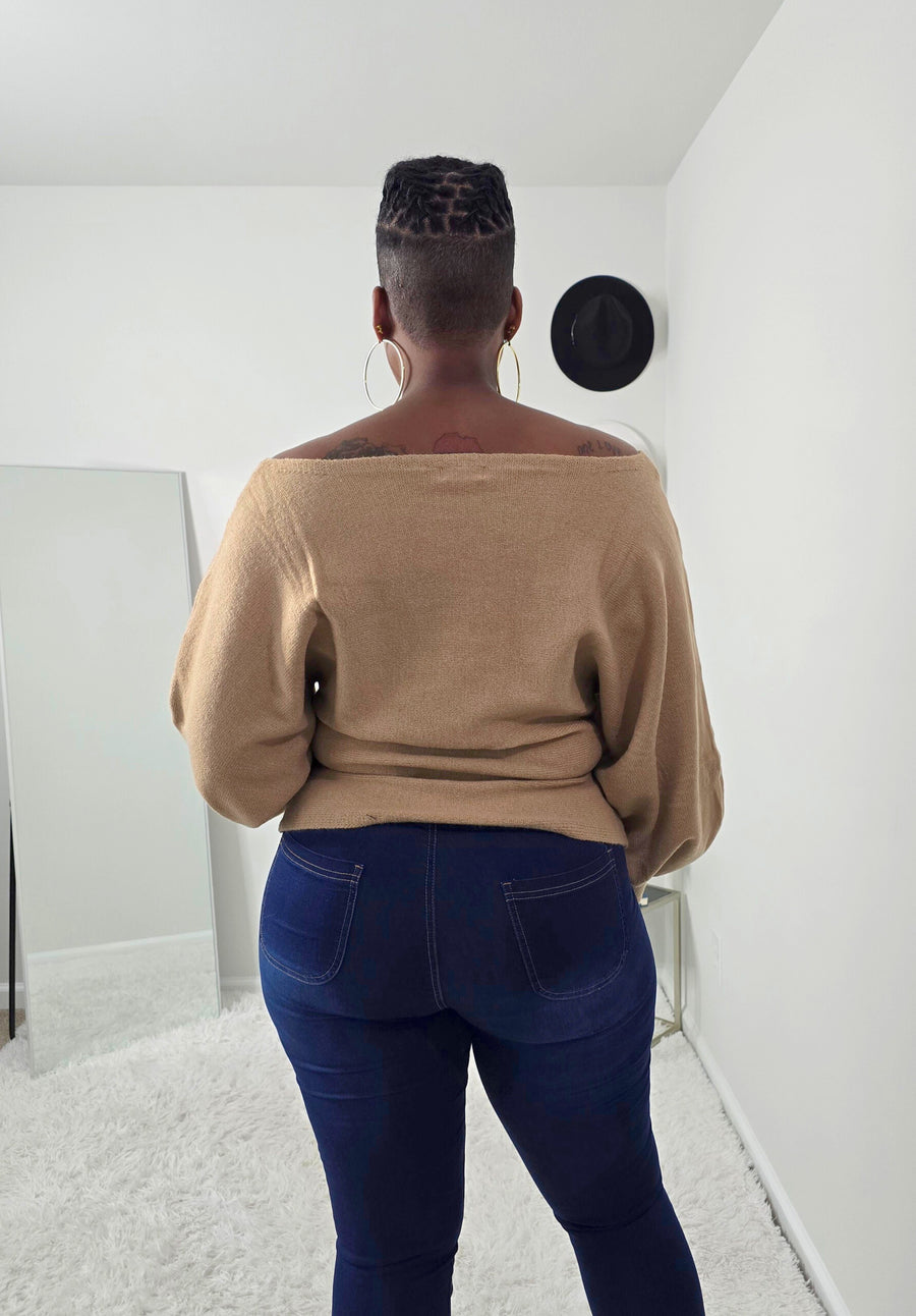 Bold abstract design women’s knit sweater with one-shoulder detail, cozy yet stylish statement piece.