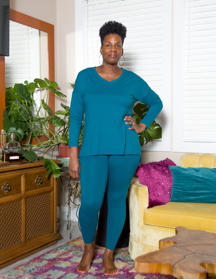 Step into luxury with our Brushed DTY Microfiber V-Neck Top and Legging Set. This ensemble blends the epitome of comfort with contemporary style, crafted from a premium blend of 90% polyester and 10% spandex. The material ensures a buttery soft feel with perfect stretch and recovery, allowing for freedom of movement while maintaining a sleek, flattering fit.  Product Description:  Top: V-neck design provides a flattering and stylish look. Leggings: High-waisted to enhance your silhouette, offering both comf