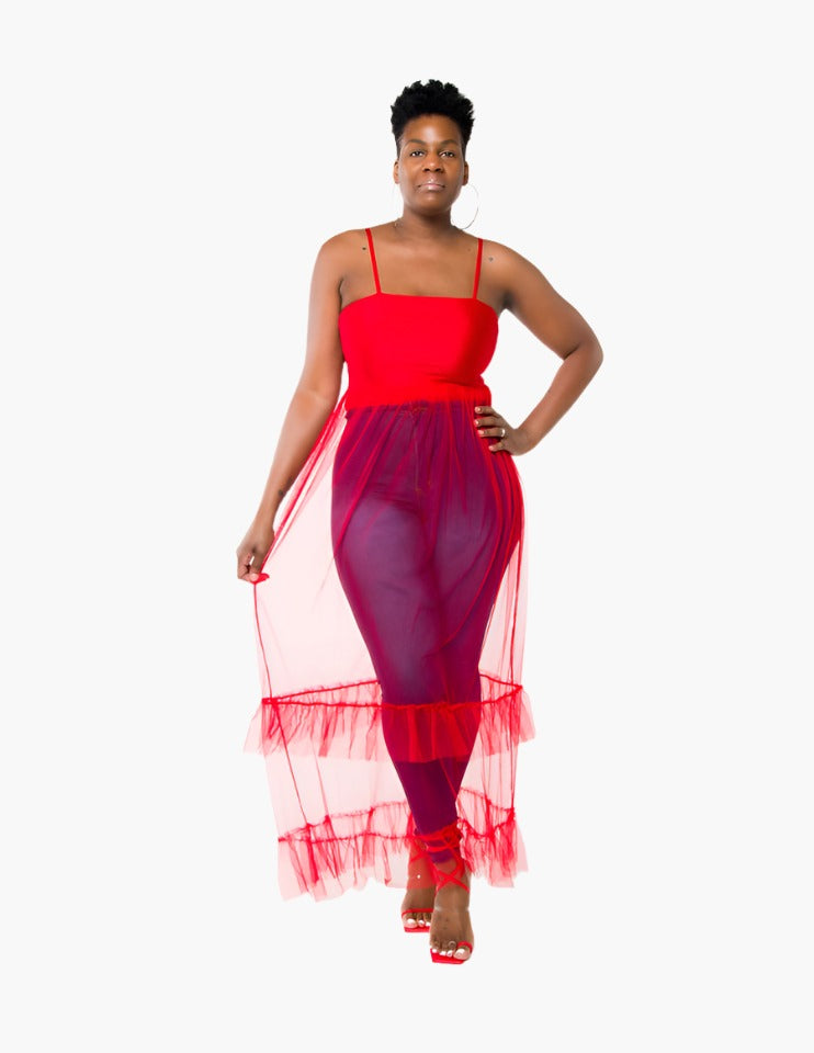 Stylish red tulle bodysuit featuring a glamorous tulle bottom and comfortable attached tank straps with a secure button closure. True to size and available in a range of sizes, designed for both comfort and a flattering fit. Perfect for versatile styling, whether paired with jeans for a casual chic look or layered under a blazer for a formal event. Model is 5'11" and wears size Large. This unique and head-turning piece is a must-have for any fashion-forward wardrobe