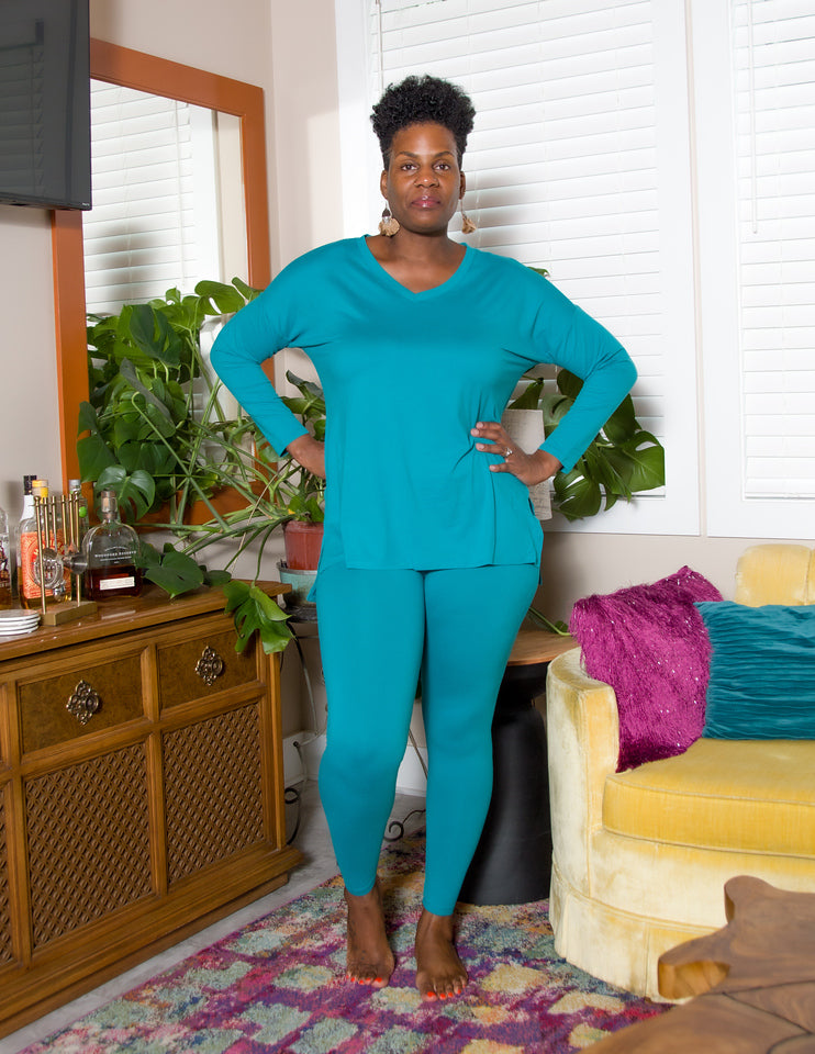 Step into luxury with our Brushed DTY Microfiber V-Neck Top and Legging Set. This ensemble blends the epitome of comfort with contemporary style, crafted from a premium blend of 90% polyester and 10% spandex. The material ensures a buttery soft feel with perfect stretch and recovery, allowing for freedom of movement while maintaining a sleek, flattering fit.  Product Description:  Top: V-neck design provides a flattering and stylish look. Leggings: High-waisted to enhance your silhouette, offering both comf