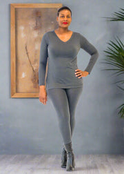 Step into luxury with our Brushed DTY Microfiber V-Neck Top and Legging Set. This ensemble blends the epitome of comfort with contemporary style, crafted from a premium blend of 90% polyester and 10% spandex. The material ensures a buttery soft feel with perfect stretch and recovery, allowing for freedom of movement while maintaining a sleek, flattering fit.  Product Description:  Top: V-neck design provides a flattering and stylish look. Leggings: High-waisted to enhance your silhouette, offering both comf