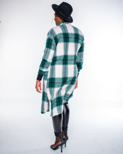 Green plaid print shirt jacket from Tosh`E Boutique, featuring long sleeves, side slits, and a turndown collar. This versatile shacket combines the structure of a jacket with the comfort of a shirt, ideal for layering and adding casual sophistication to any outfit. Machine washable for easy care.