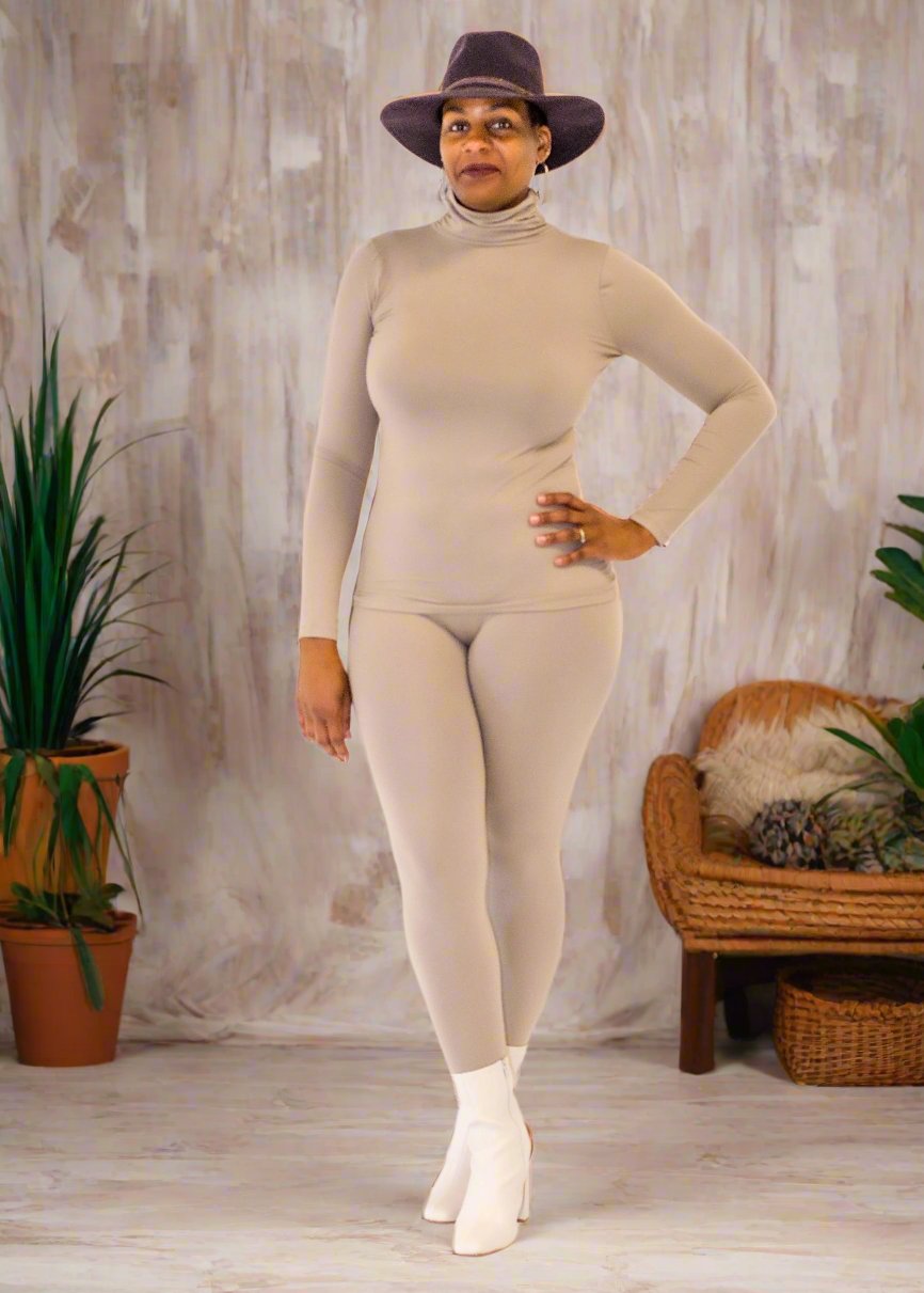 Step into luxury with our Brushed DTY Microfiber Mock Neck Top and Legging Set. This ensemble is the epitome of comfort meets style, crafted from a premium blend of 90% polyester and 10% spandex. The material ensures a buttery soft feel with perfect stretch and recovery, allowing you freedom of movement while maintaining a sleek, flattering fit.  Product Description:  Top: Mock neck design provides a modern and stylish look. Leggings: High-waisted to enhance your silhouette, offering both comfort and style.