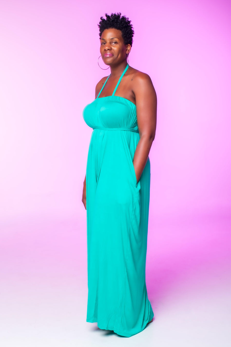 Teal Wide Leg Jumpsuit  Introducing our Teal Wide Leg Jumpsuit, crafted from stretch material to ensure a comfortable fit that runs slightly large. This sleeveless jumpsuit features wide legs and practical pockets, offering both style and functionality. The vibrant Teal hue adds a bold and stylish statement to your wardrobe, perfect for making a standout impression.  