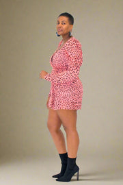 Introducing our Coral Print Mini Dress, an essential addition to your wardrobe. Featuring a vibrant coral base adorned with a chic leopard print overlay, this dress exudes contemporary elegance. Complete with a matching belt for a tailored fit, its peplum sleeves and shirt dress style offer a sophisticated flair, ideal for your next night out or special occasion. Embrace effortless style and make a statement with this versatile piece that combines bold patterns with refined charm. 