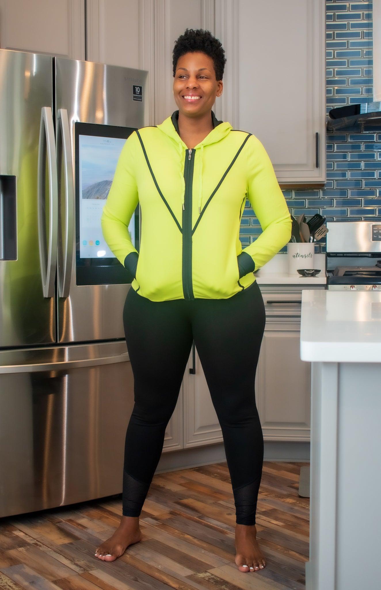 Neon Yellow Workout Set  Break a sweat in style with our neon yellow workout set! This set includes a jacket with a handy hood, pockets for convenience, and high-waisted training leggings featuring lace detail on the ankles. Designed for both fashion and functionality, you'll be ready to tackle your fitness goals with confidence and flair.  Key Features:  Jacket with Hood: Provides coverage and protection during workouts. Pockets: Offers storage for essentials like keys or phone. 