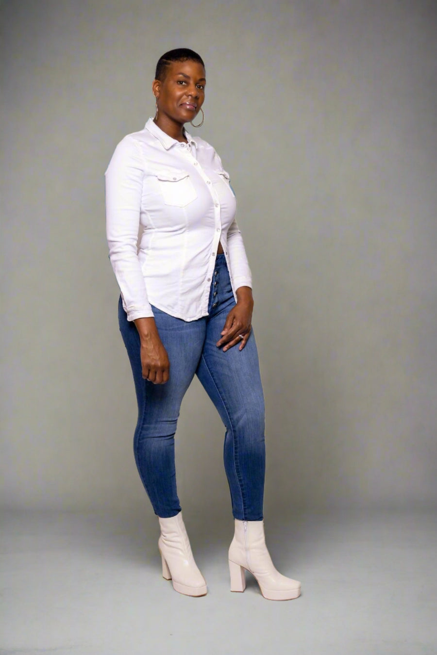 High Rise Curvy Denim - Perfect for a Modern, Yet Timeless Look  Elevate your denim collection with our High Rise Curvy Denim jeans. Available in a sophisticated dark blue wash, these jeans are designed to enhance your curves and provide a luxurious silhouette.  Key Features:  High Rise: Rises 10 inches for a flattering fit. Curvy Fit: Tailored to accentuate your curves. 