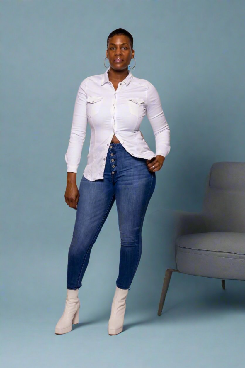 Stretch Denim Shirt  Elevate your modern wardrobe with our Stretch Denim Shirt from Tosh`E Boutique. Crafted from a blend of 97% Cotton and 3% Elastane, this shirt offers endless comfort and durability. The long sleeves and bodycon style provide an effortless, flattering fit that transitions seamlessly from day to night.  Key Details:  Crafted from 97% Cotton and 3% Elastane blend Long sleeves Bodycon style Model Details:  Height: 5'11" Size Worn: 